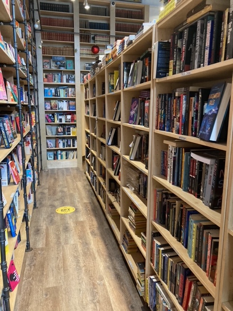 The main floor of Massy Books with shelves on casters.