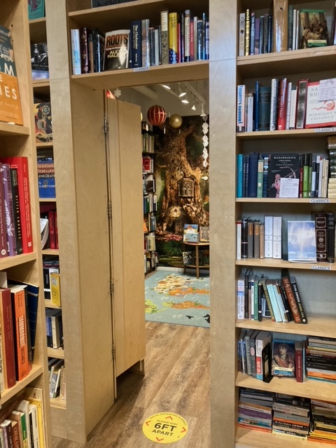 Inside Massy Books, a doorway leading to a second room.