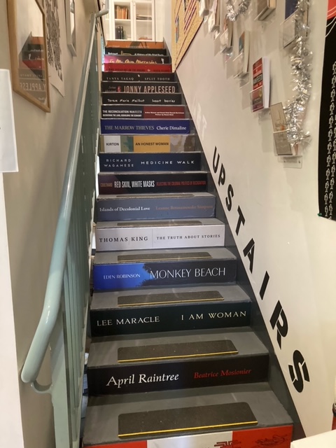 Inside Massy Books, a stairway leading to the upper floor.